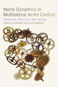 Book cover with title 'Norm Dynamics in Multilateral Arms Control' over a detailed arrangement of interlocking brass and steel clock gears.