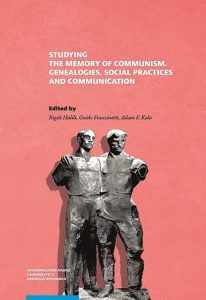 Pink book cover with a photograph of a statue, title and author names.